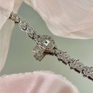 Elegant Vintage Silver Watch with Diamond Accents